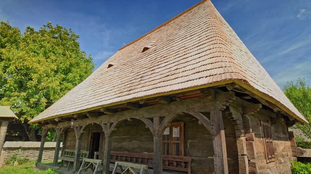 Traditional Romanian rustic Wooden House Architecture with shingle roof