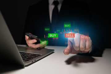 Businessman with Graph Analysis Business traders and investors are analyzing market up and down graphs and business operations data graphs, profit and loss analysis. Data analysis concepts.