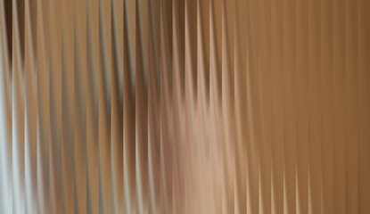 Abstract Glass Lines and Soft Hues. A close-up view of textured glass with vertical lines, creating an abstract and artistic display of light and shadow