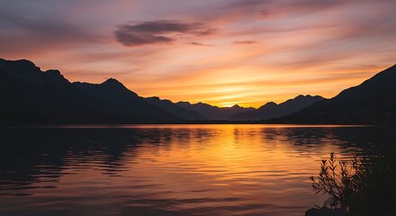 Fototapeta premium Majestic Mountain Lake at Sunset with Fiery Sky Reflection.