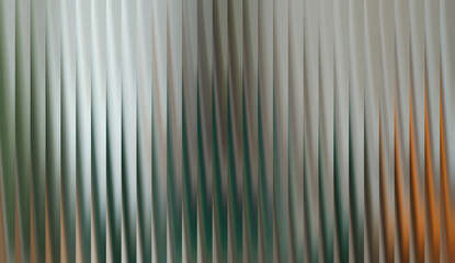An artistic, blurred vertical striped abstract image, perfect for background use. The image is blurred, giving a dreamy and artistic feel. The lines create a sense of movement and visual interest