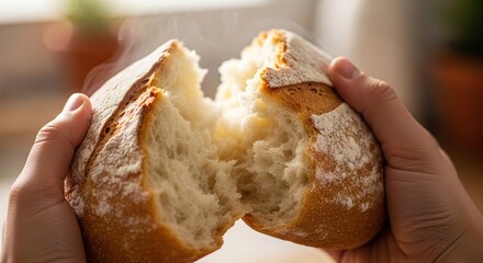 Fresh baked sourdough bread loaf artisan bakery hands tearing bread crusty delicious homemade food photography