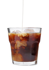 Pouring milk into iced coffee on white background, closeup