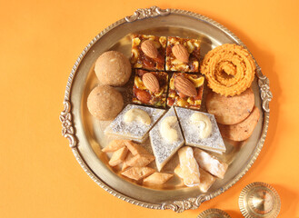 Indian Festival Diwali snacks called Faral like Laddu Chakli, Kajukatli, shankarpale etc 
