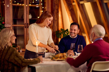 Warm Christmas Family Dinner With Friends, Wine, and Candlelit Table Conversation, Joyful Evening