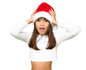 Portrait of a excited child girl in red santa Claus hat on transparent background. PNG transparent. PNG transparent
