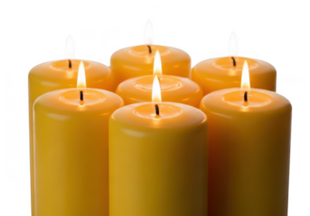 Burning yellow candles group isolated on transparent background