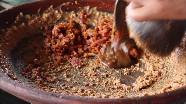 A thick sauce made from ground peanuts, palm sugar, shrimp paste, salt, and garlic, pounded until smooth and rich in flavor. It&rsquo;s used as a savory dressing for gado-gado, a traditional Indonesian food