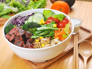 Healthy Beef and Vegetable Buddha Bowl with Brown Rice and Fresh Salad