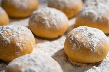 Ball Ready Dough On Floured Kitchen Table low angle view cooking background