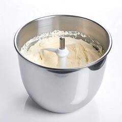 Creamy mixture in stainless steel bowl