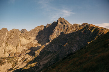 Fototapeta premium Rocky Mountain Range Under Clear Sky