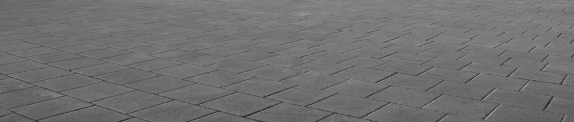 empty stone floor top in perspective. grey tile floor background in perspective view. line. empty copy space stone street. pavement. Granite outdoor tiled floor. gray granite. Marble texture