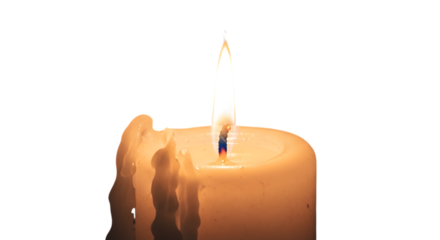 Close up of a lit white candle with melting wax and a bright flame isolated on transparent background