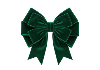 Isolated festive emerald green velvet bow for Christmas or Holiday decor and embellishment