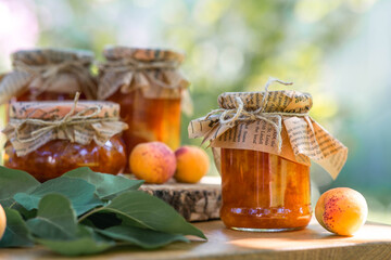 Sweets and fruits. Homemade healthy jelly, apricot jam. Preserving and harvesting in the summer. Preparing jars.