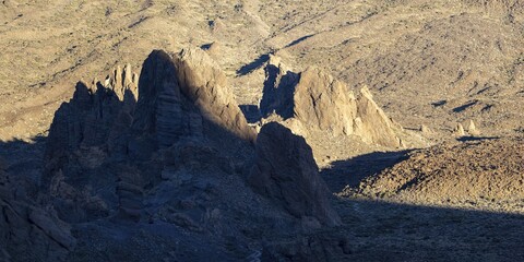 Panorama during the ascent to Alto de Guajara, 2715m, to the bizarrely shaped towers of volcanic rock, Roques de García, at sunrise, Teide National Park, Parque Nacional del Teide, Tenerife, Canary Islands, Spain