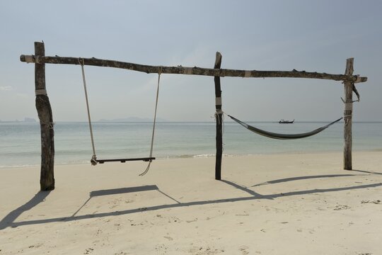 Swing and hammock on the beach of Koh Mook Island, Andaman Sea, Satun Province, Southern Thailand, Thailand