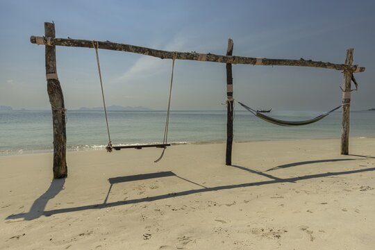 Swing and hammock on the beach of Koh Mook Island, Andaman Sea, Satun Province, Southern Thailand, Thailand