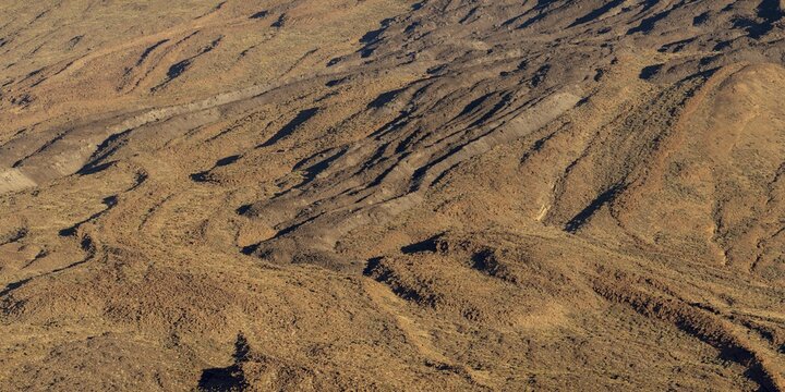 Panorama during the ascent to the Alto de Guajara, 2715m, over the Teide National Park, Parque Nacional del Teide, with solidified lava flows at the foot of the Pico del Teide, 3715m, at sunrise, Tenerife, Canary Islands, Spain