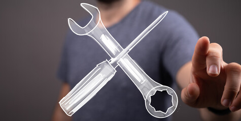 Hand reaching for digital tools, wrench and screwdriver. Repair, maintenance, service, support,...
