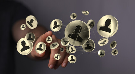 A conceptual image about teamwork, network and connection with 3D person symbols on a human finger. Perfect for business themes.