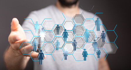 Concept of social network, communication, global networking and community. Hand touching a digital interface with people icons. Connections, net