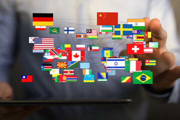 Hand holding connected world flags representing business networking, international collaboration, and travel concepts. A visual for globalizatio