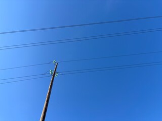 power lines on a blue sky