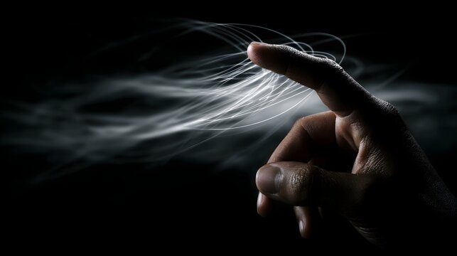 A fingertip touching abstract luminous light streaks symbolizing digital connection and creative energy against a dark background - Powered by Adobe