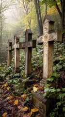 Naklejka premium Four old wooden crosses display intricate carvings in a misty forest filled with colorful autumn foliage