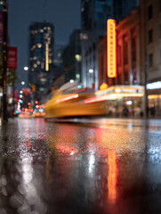 Obraz premium Urban abstract capturing the city at night. Rain slicked streets reflect vibrant neon lights and blurred motion, evoking energy modern life. Great for backgrounds.
