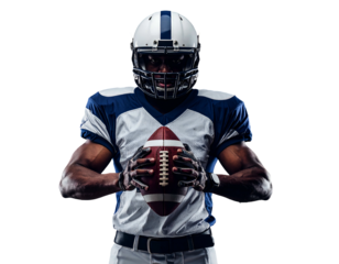 A football player holds the ball with dark skin, wearing a helmet and pads