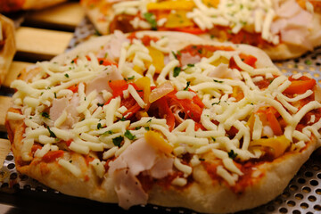close up of pizza topped with cheese