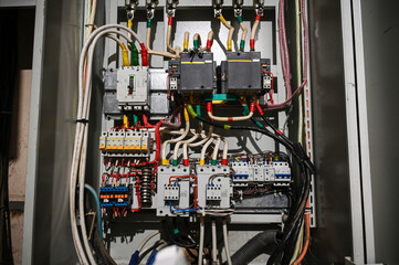 Industrial Electrical Control Panel Interior with Wiring, Contactors, and Circuit Breakers