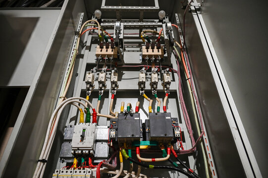 Industrial Electrical Control Panel Interior with Wiring, Contactors, and Circuit Breakers