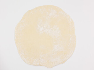 Raw Dough Round Disk On White Background Ready For Baking And Cooking