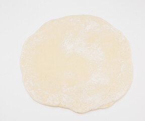 Raw Dough Round Disk On White Background Ready For Baking And Cooking