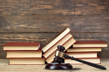 Law and Justice, Legality concept, Judge Gavel on a wooden background, Law library concept.