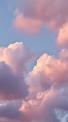 Pastel Cloudscape At Sunset Over Blue Sky With Fluffy Pink Clouds, Serene And Dreamy, For Nature Photography, Travel, Wellness