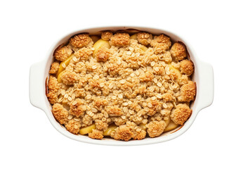 Delicious apple crumble in a white baking dish isolated on transparent background