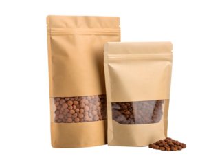 Two different sized brown kraft paper stand up pouches with transparent windows contain round snacks, isolated on clean background.