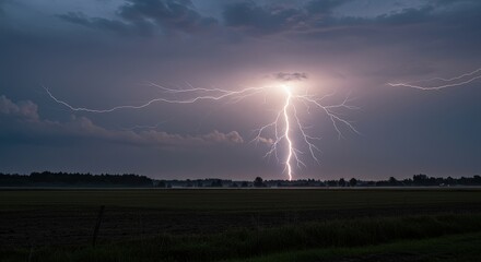 Lightning strike over dark landscape dramatic sky dramatic weather
