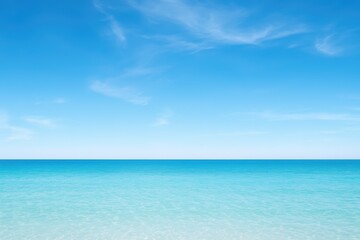Fototapeta premium Calm ocean waves lapping against the shore tropical beach tranquil seascape bright blue skies panoramic view serene nature escape