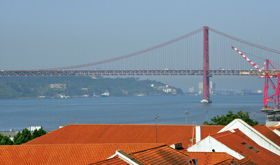 25 de Abril Bridge spanning the Tagus River in Lisbon, Portugal.