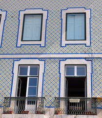 characteristic building of Lisbon, Portugal, recognizable by its facade decorated with azulejos, the typical glazed and decorated ceramic tiles, a distinctive element of Portuguese architecture