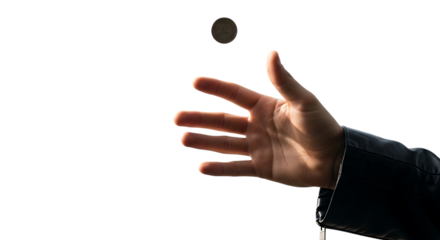 Human hand tossing a coin in the air with a dark background flipping, isolated on a white or transparent background, cutout, PNG