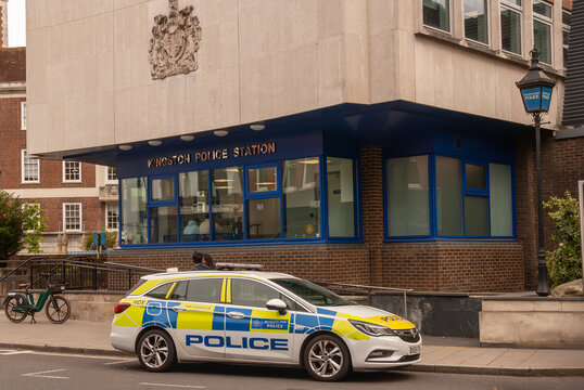 Kingston Police Station, police car standing on a street. UK, London. England.