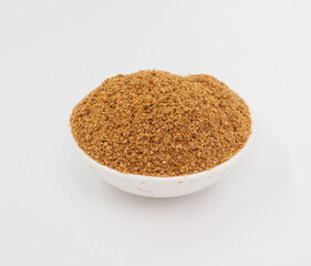 Fine Grained Brown Spice In White Bowl On Clean White Background