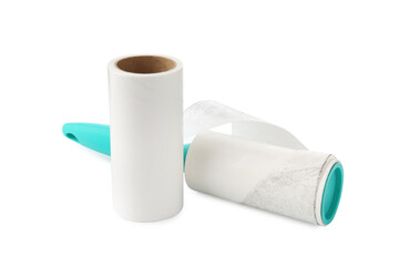 Lint roller with used sticky tape and new adhesive roll isolated on white